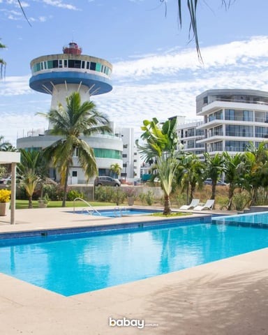 Aerial view of Isla Marina complex with pool and waterway